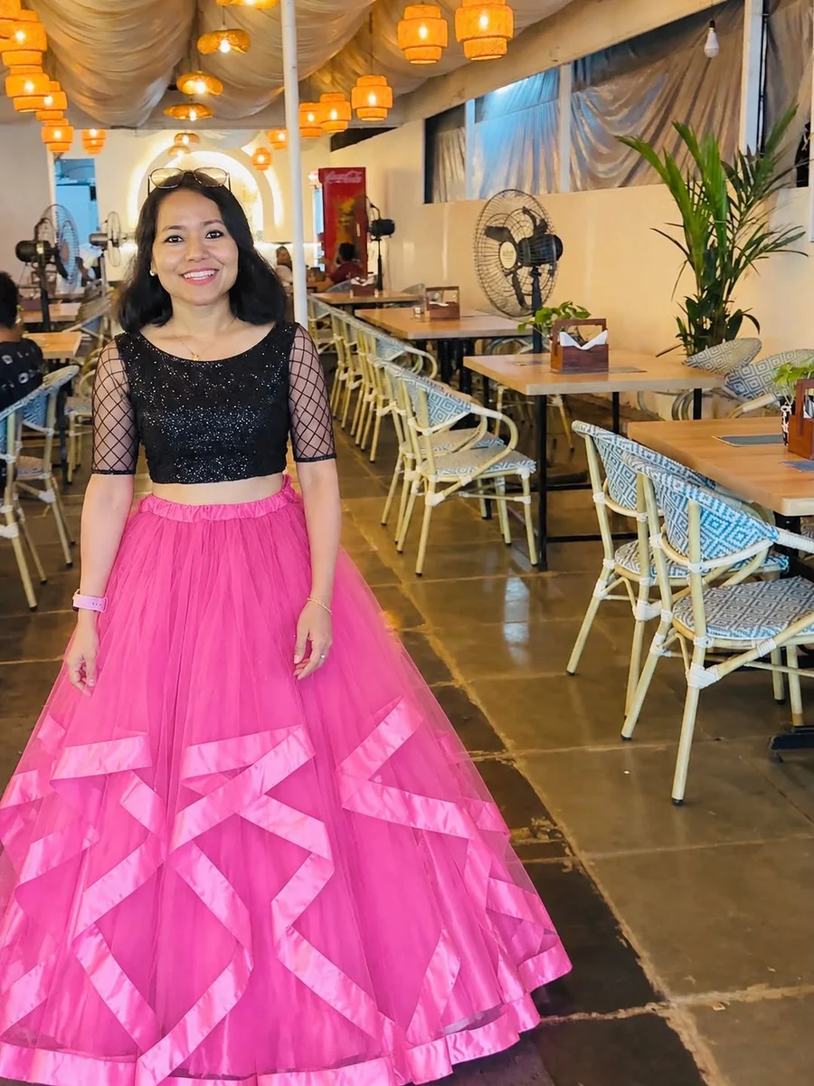 Sequins Up Top, Tulle on the Bottom on a petite woman