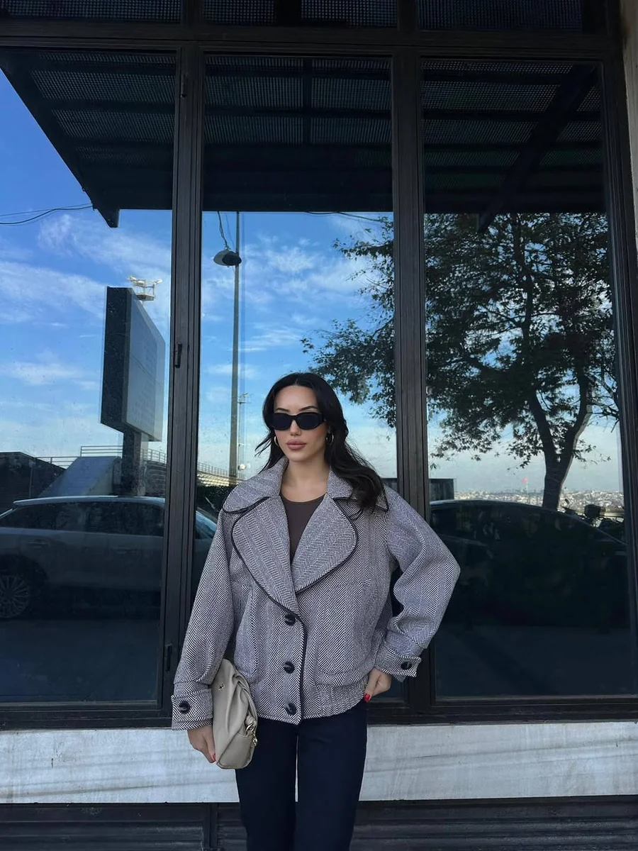The Cropped Statement-Collar Jacket on a petite woman
