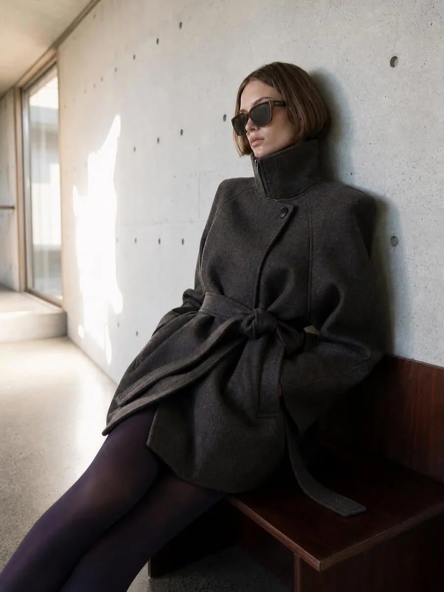 Belted Dark Coats Over Dark Tights on a petite woman
