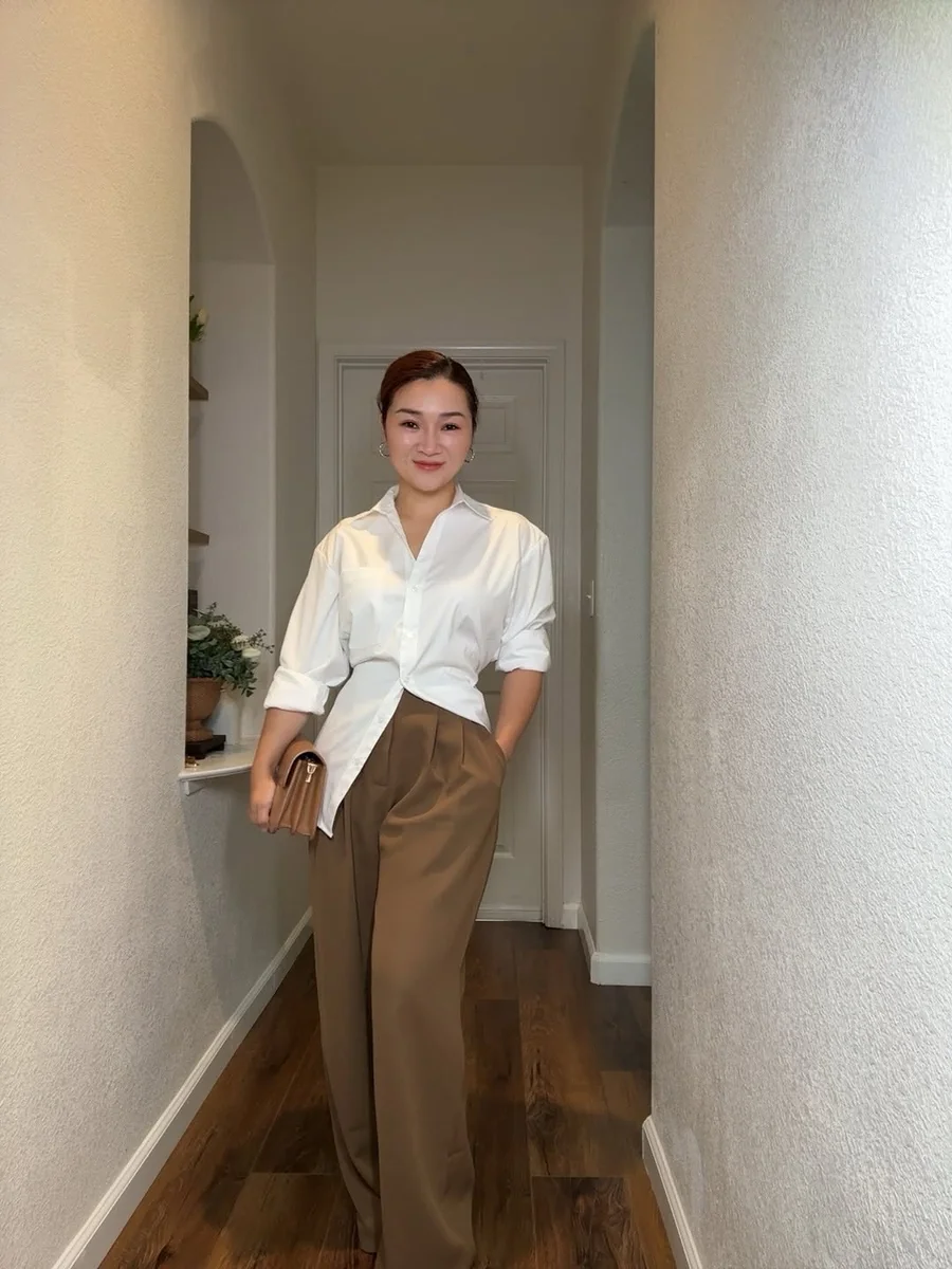 The Twist-Front Shirt and Wide-Leg Trousers on a petite woman