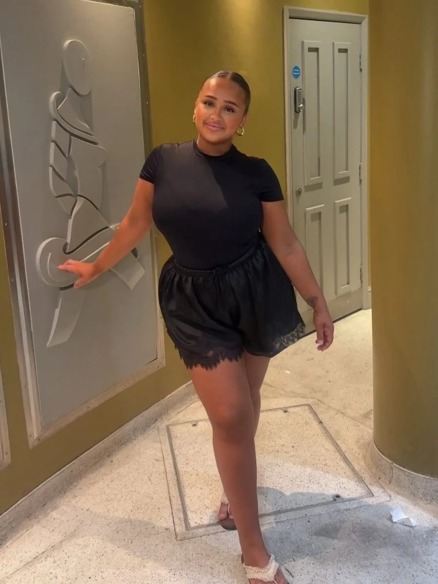 Black Satin Shorts, Styled Sleek on a petite woman