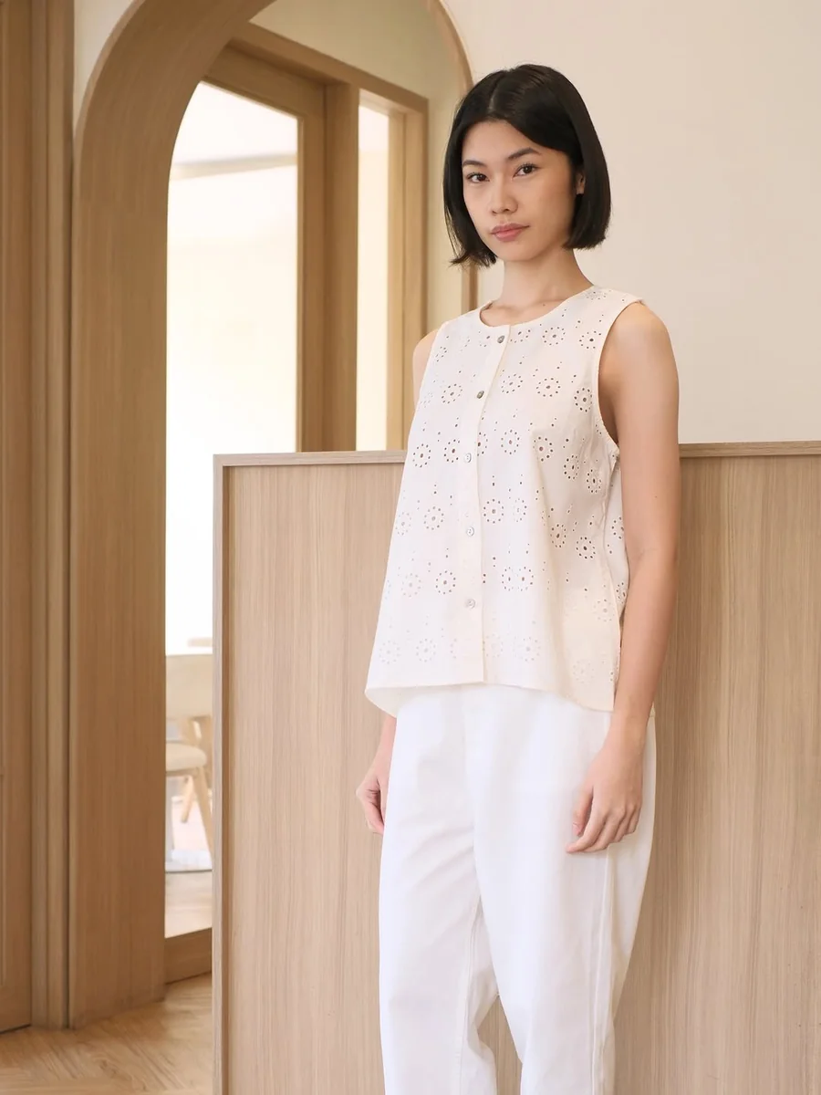 Eyelet Tops and White Wide-Legs on a petite woman