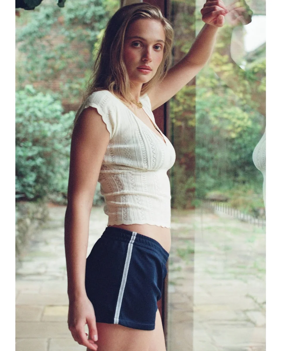 Sporty Stripes: Track Shorts Done Right on a petite woman