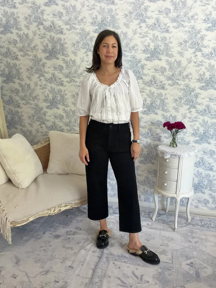 White Peasant Blouse, Black Cropped Flares on a petite woman