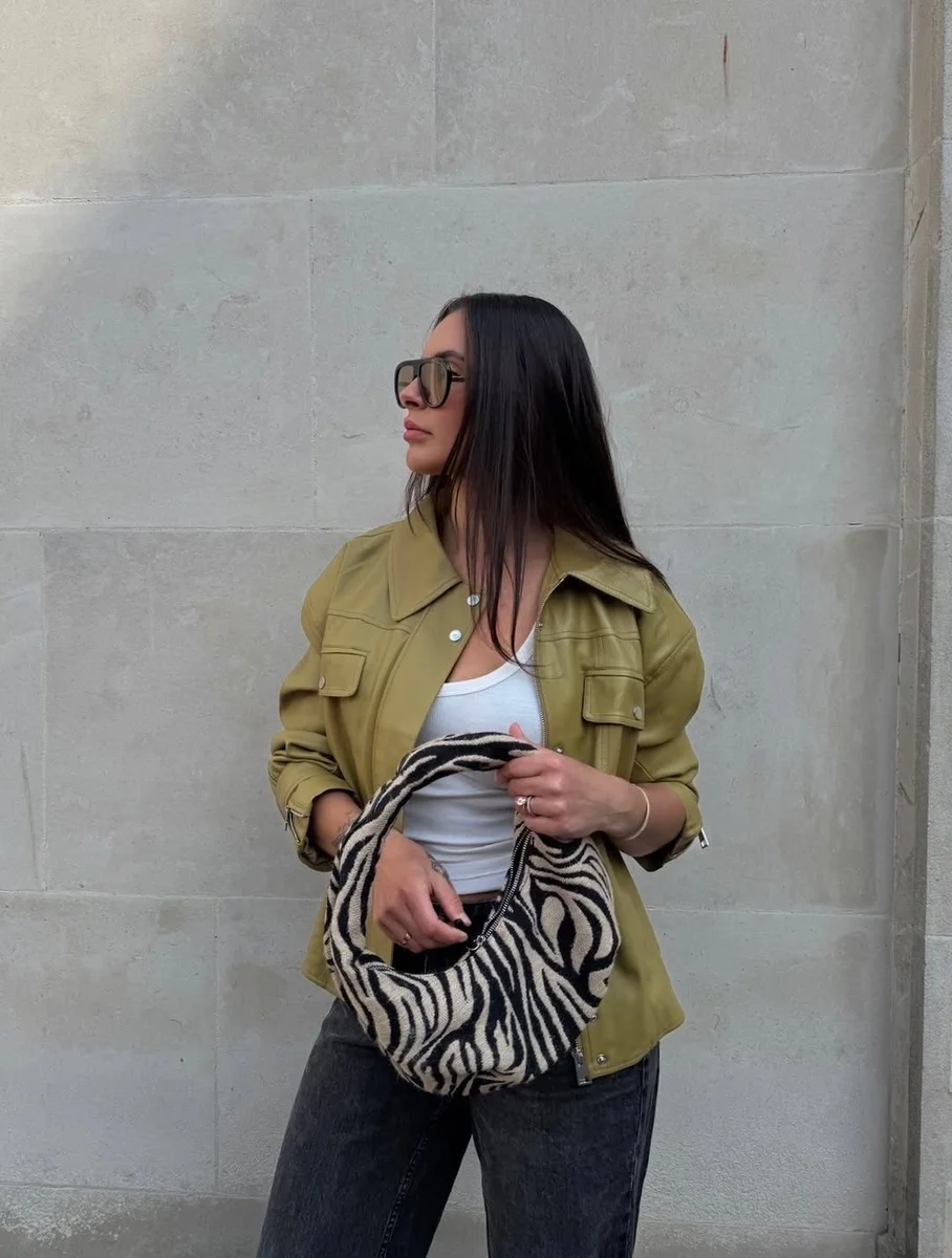 One Zebra Bag, Endless Outfits on a petite woman