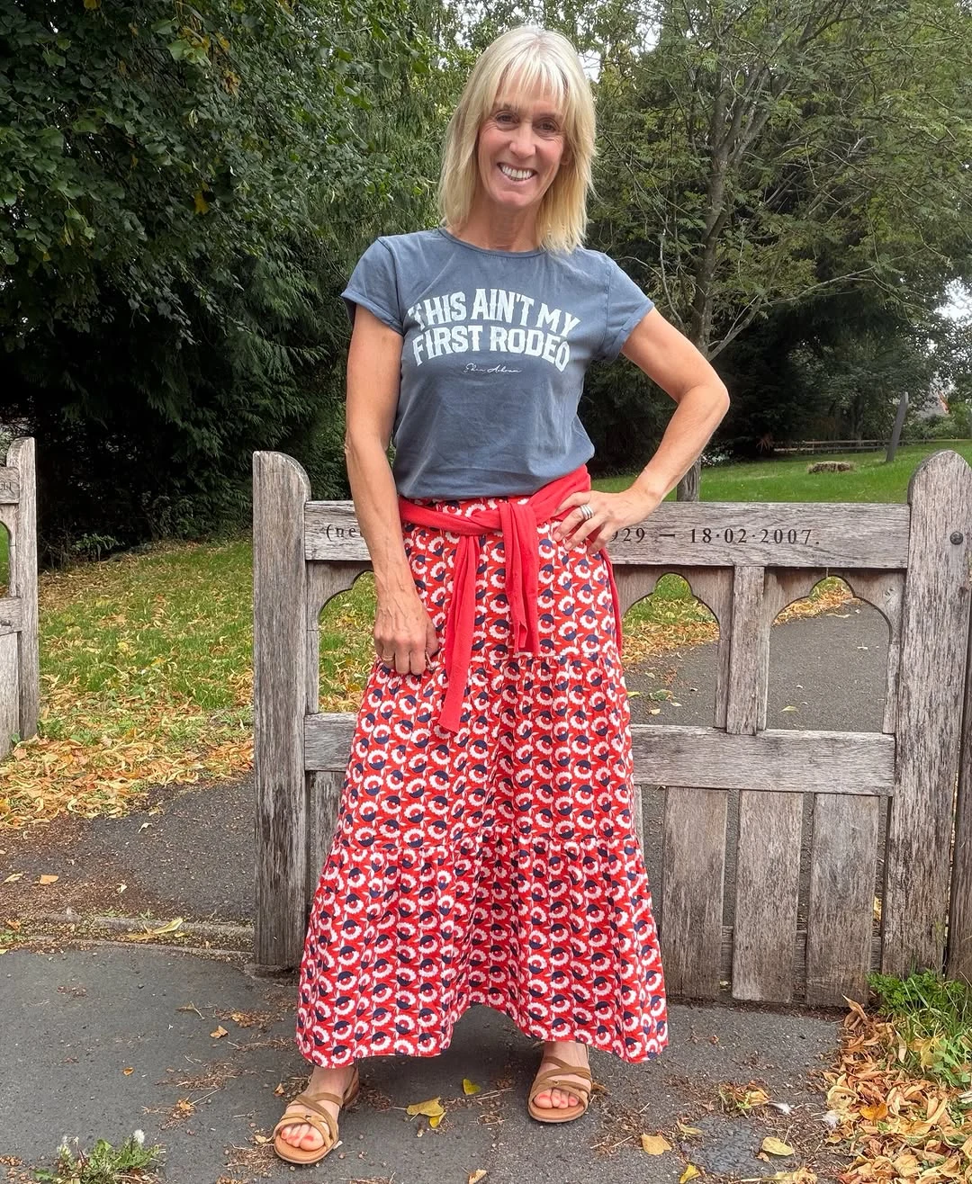 A Black Tee Meets a Colorful Maxi Skirt on a petite woman