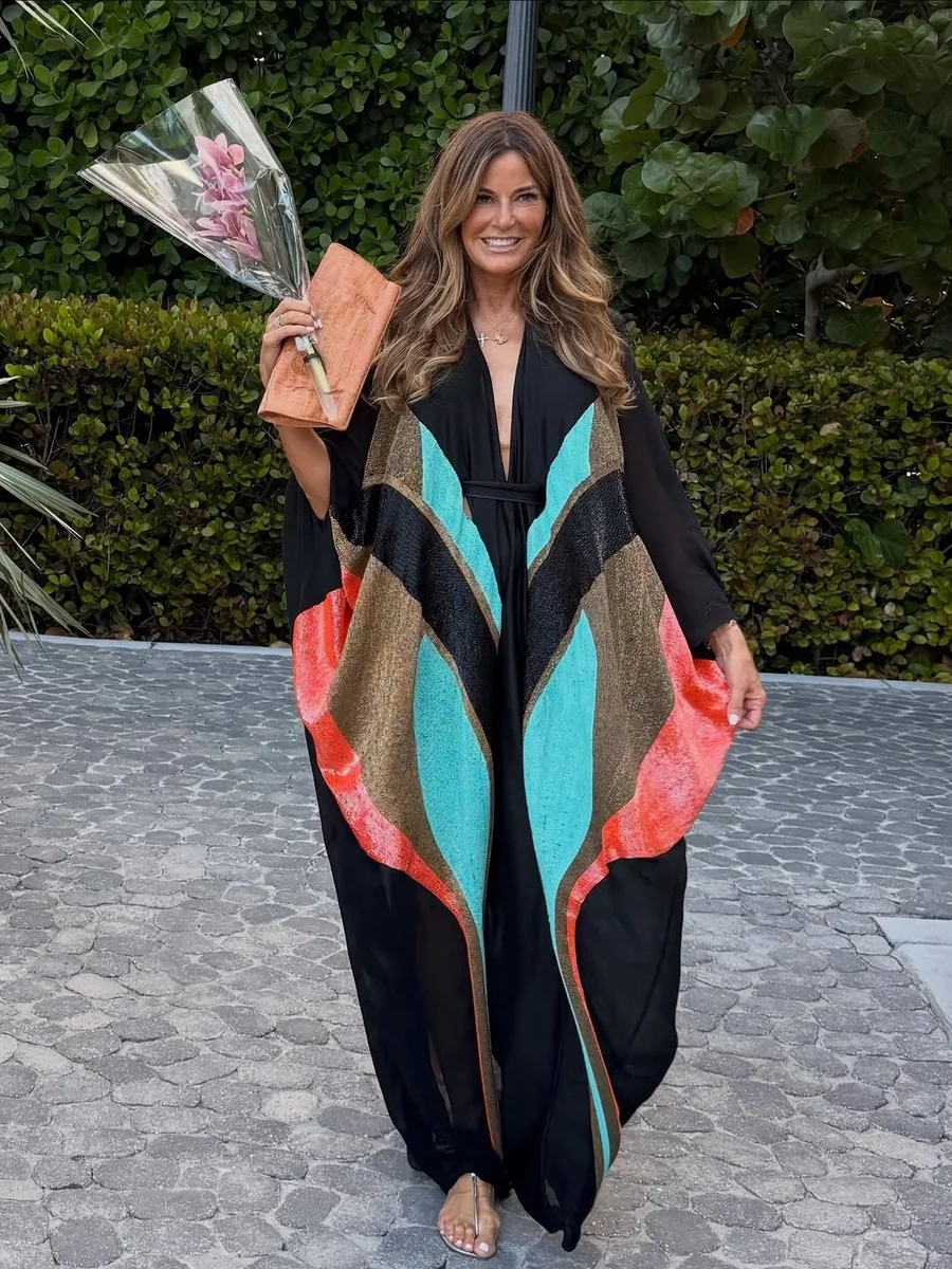 The Caftan, One Piece and Done on a petite woman