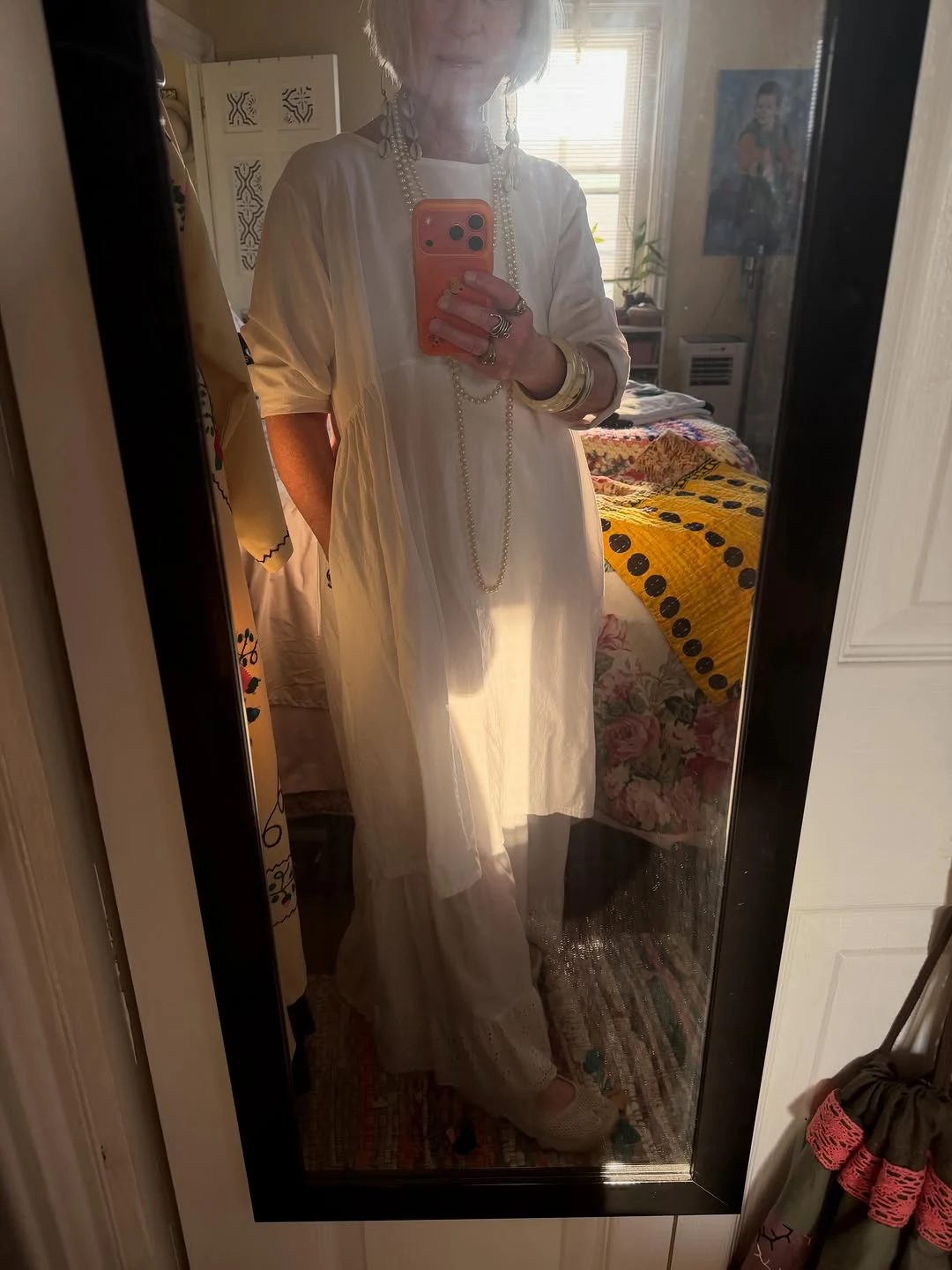 Pearls and a White Dress on a petite woman