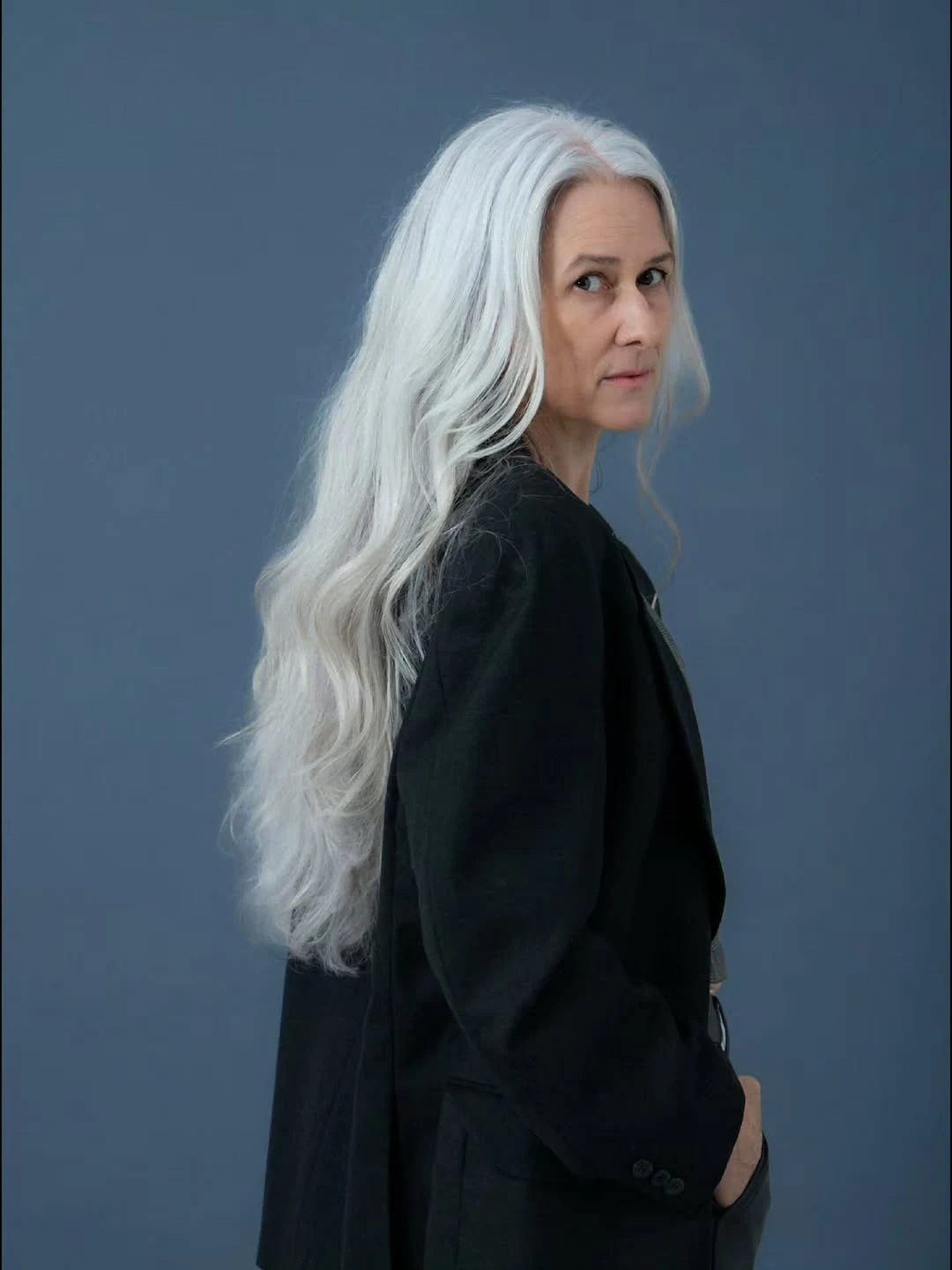 Seated, the Black Blazer Still Wins on a petite woman
