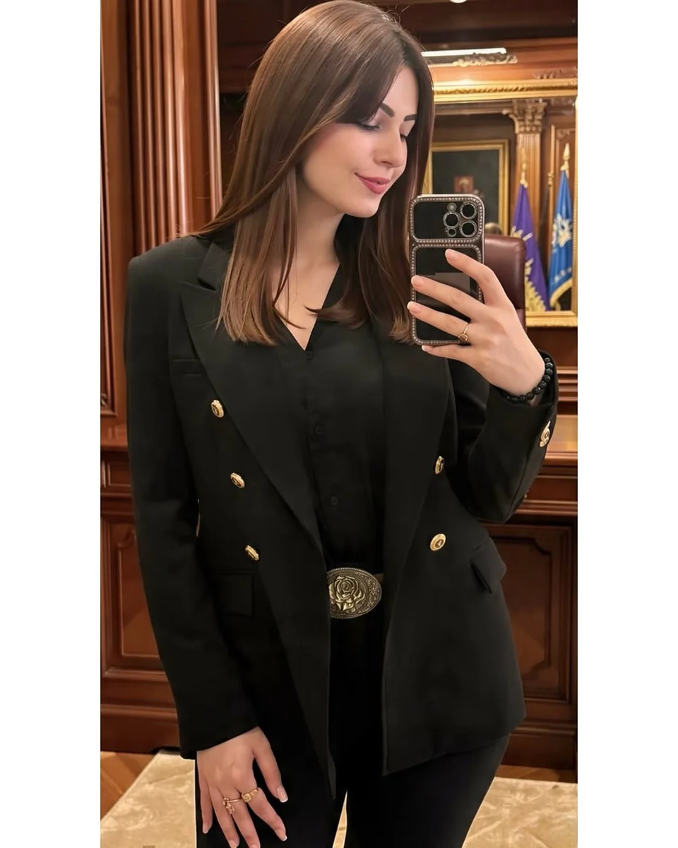 The Double-Breasted Blazer With Gold Buttons on a petite woman