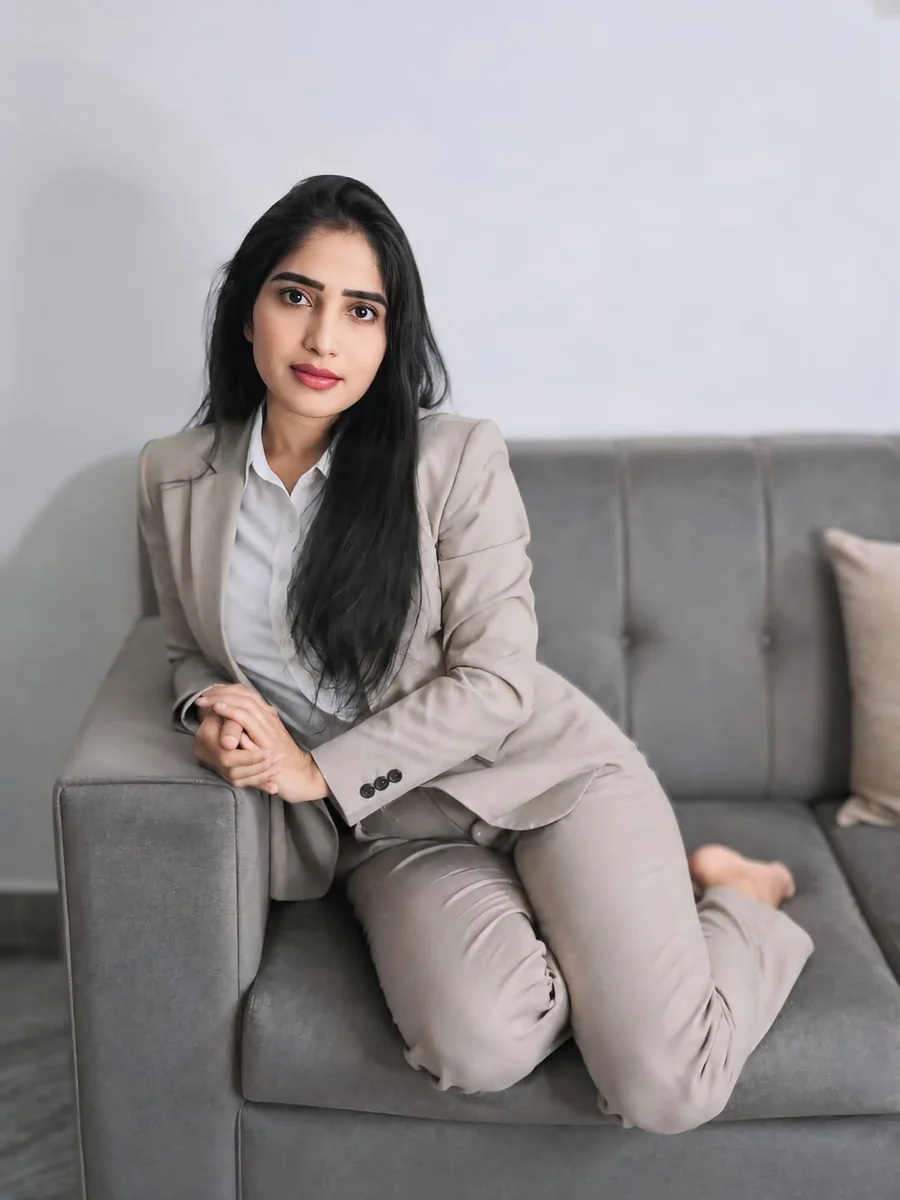 Light Gray Suit on the Couch on a petite woman