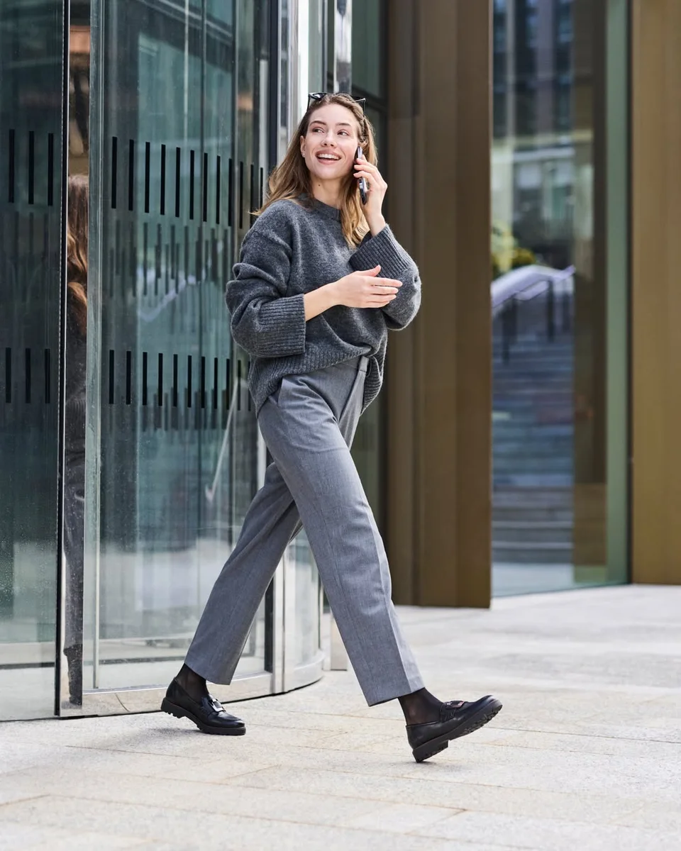 Sweater and Trousers, the Commute Uniform on a petite woman