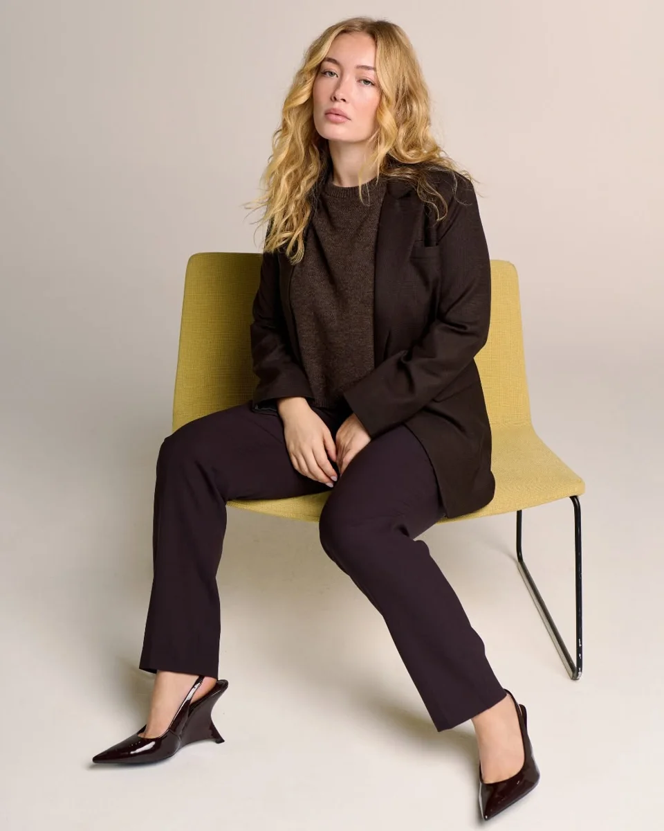 The Head-to-Toe Chocolate Suit on a petite woman