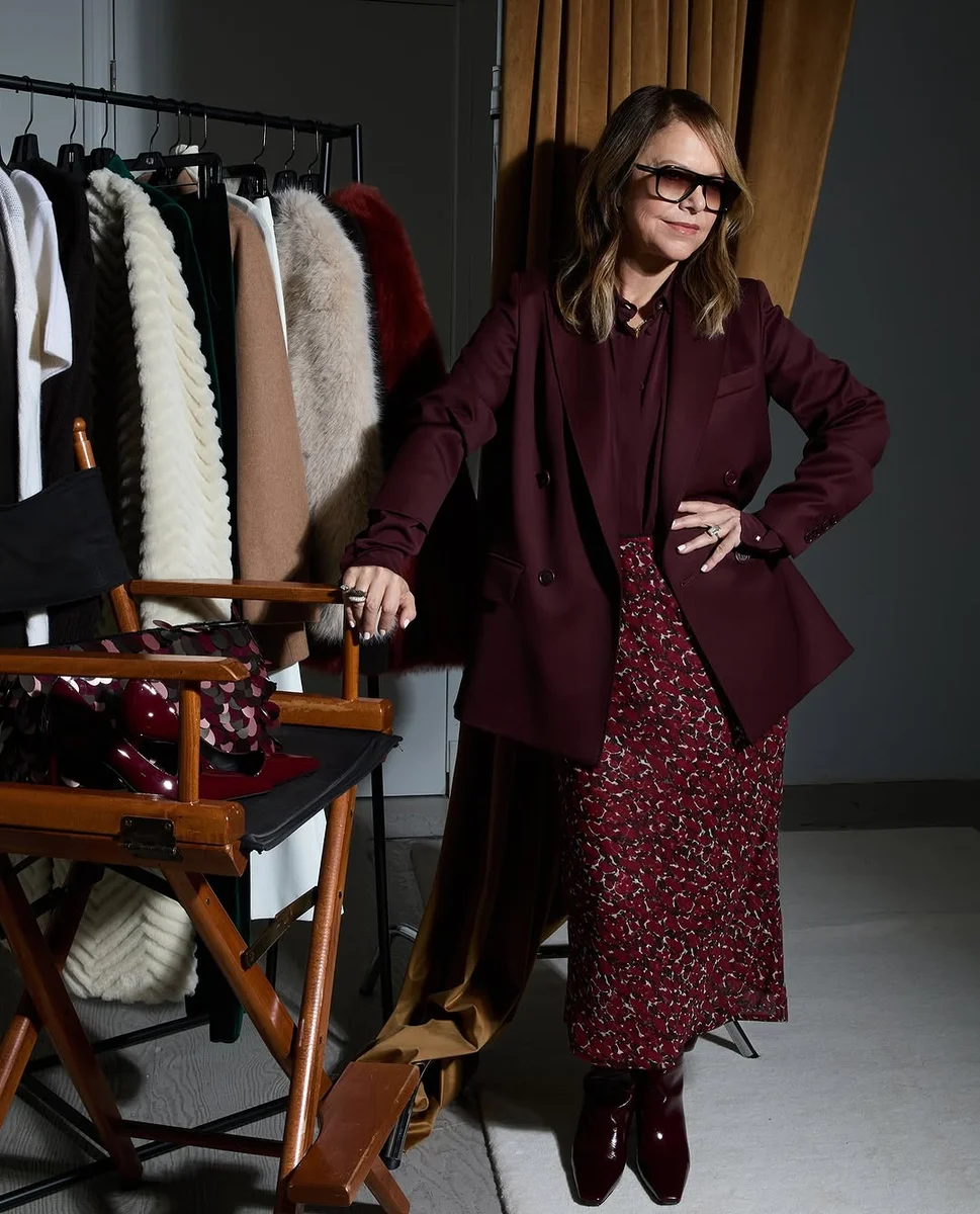 Burgundy Blazer Over a Floral Midi Skirt on a petite woman