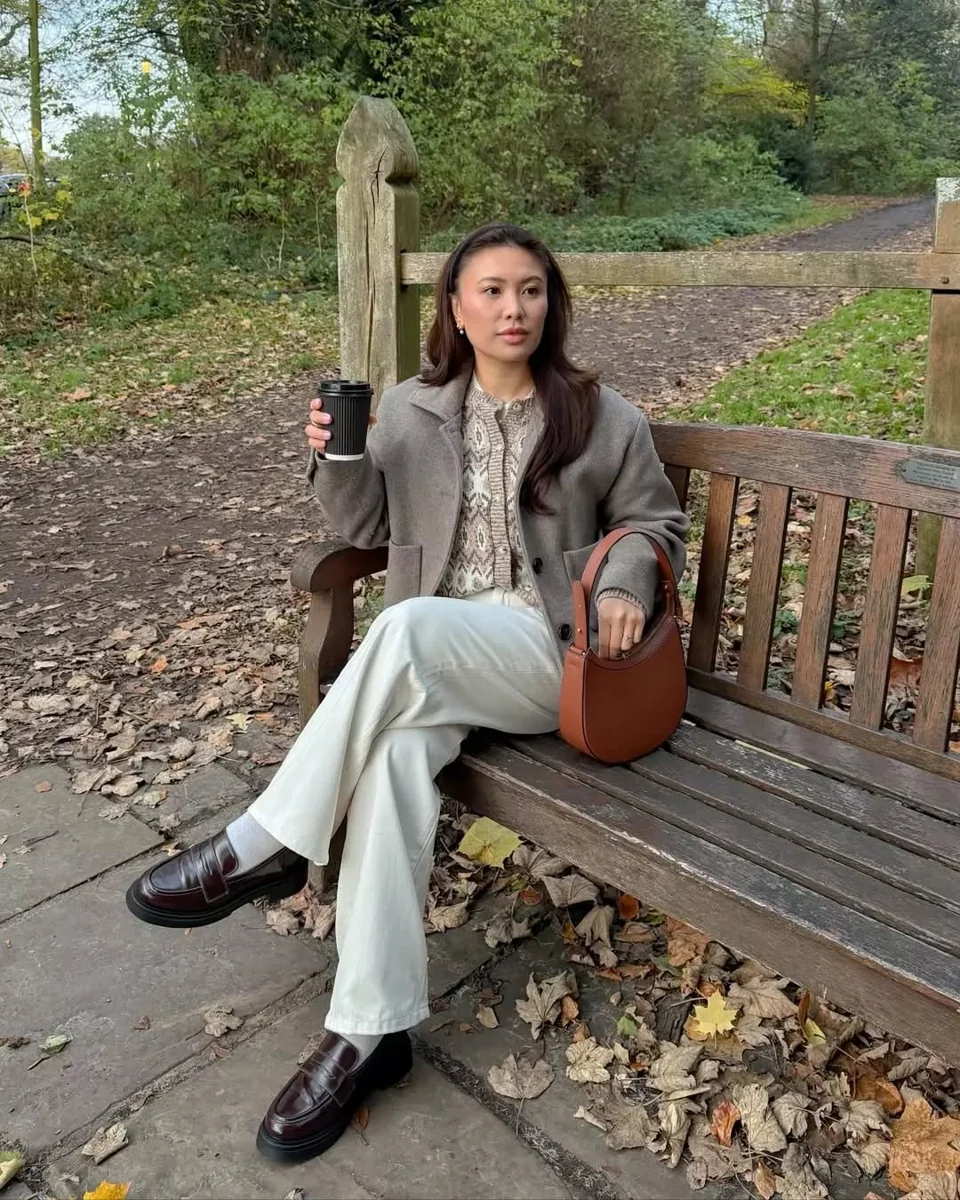 Fair-Isle Knit Under a Cropped Taupe Jacket on a petite woman