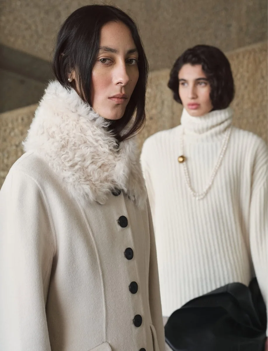 The Cream Coat With a Faux-Fur Collar on a petite woman