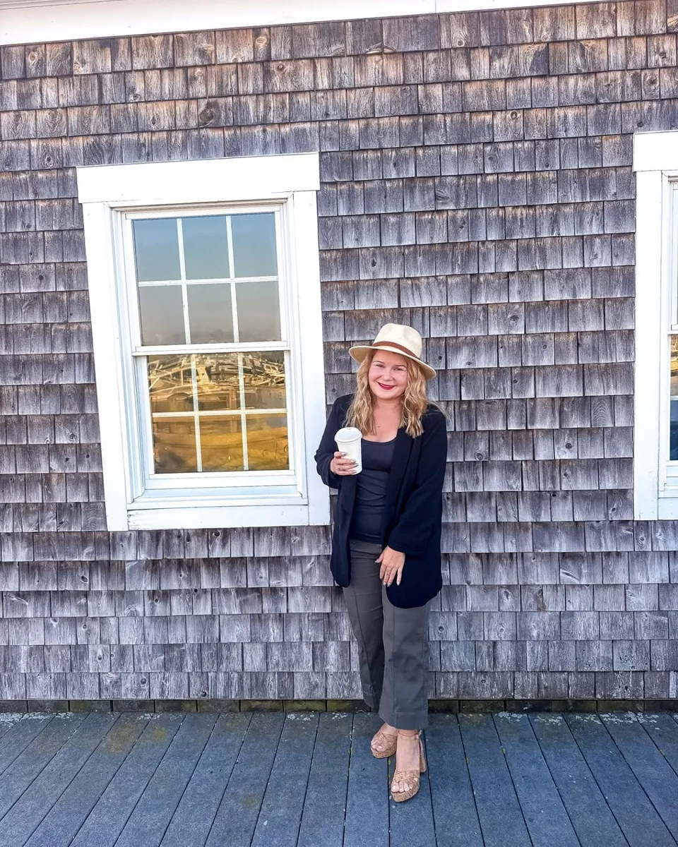 Black Cardigan and Cropped Trousers for Mild Winter Days on a petite woman