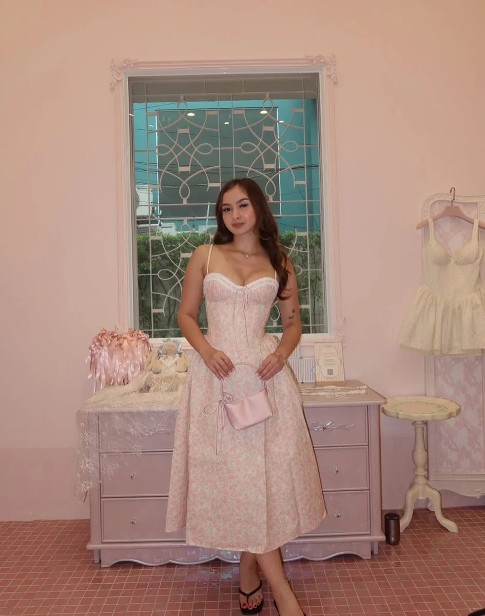 The Corset-Style Midi for Date Nights on a petite woman