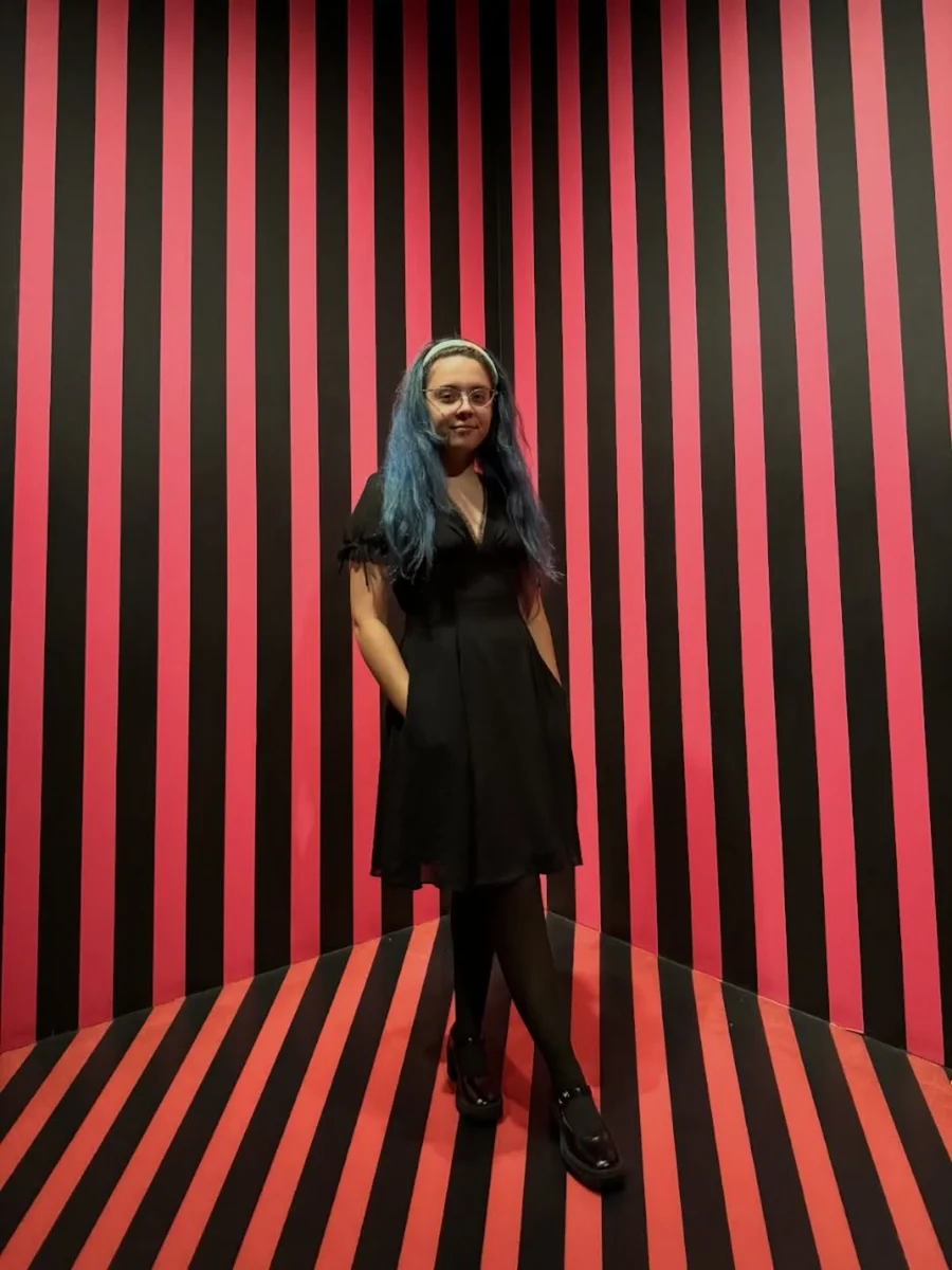 The Black V-Neck Day Dress Petite Brands Get Right on a petite woman