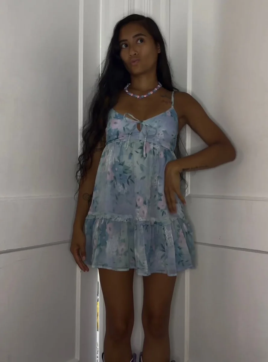 The Ruffled Tiered Mini for Easy Weekend Plans on a petite woman