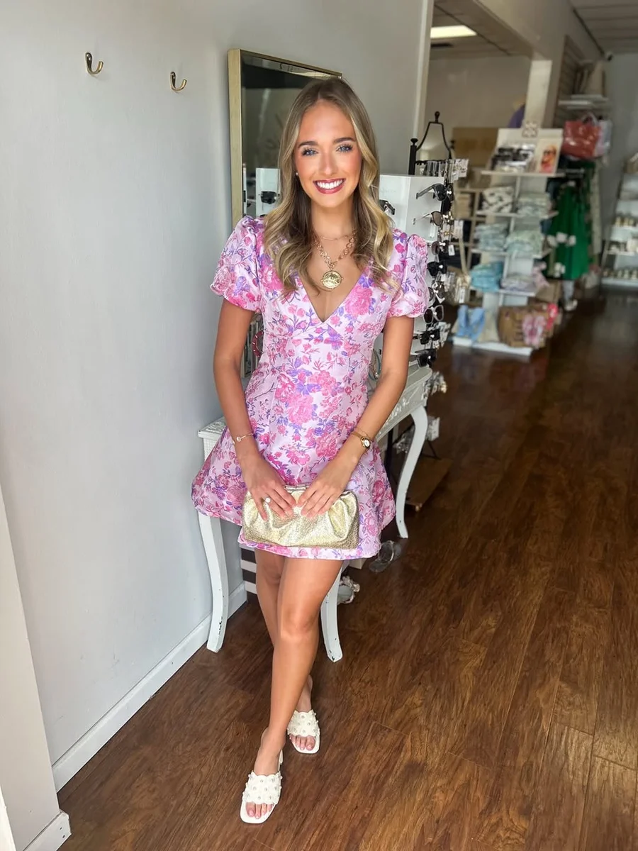 The Puff-Sleeve Floral Mini for Brunch Dates on a petite woman
