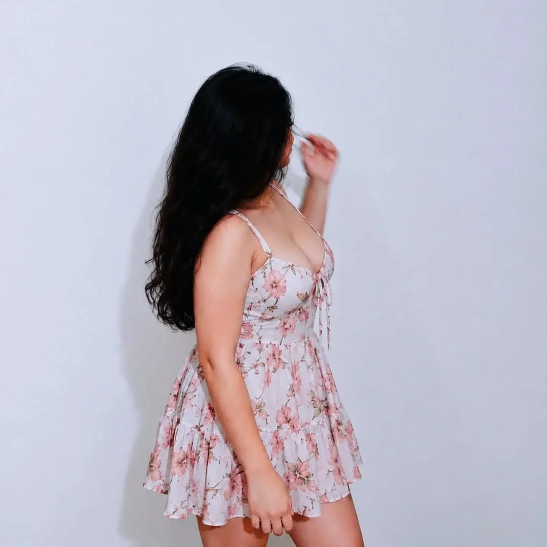The Open-Back Mini for a Little Drama on a petite woman