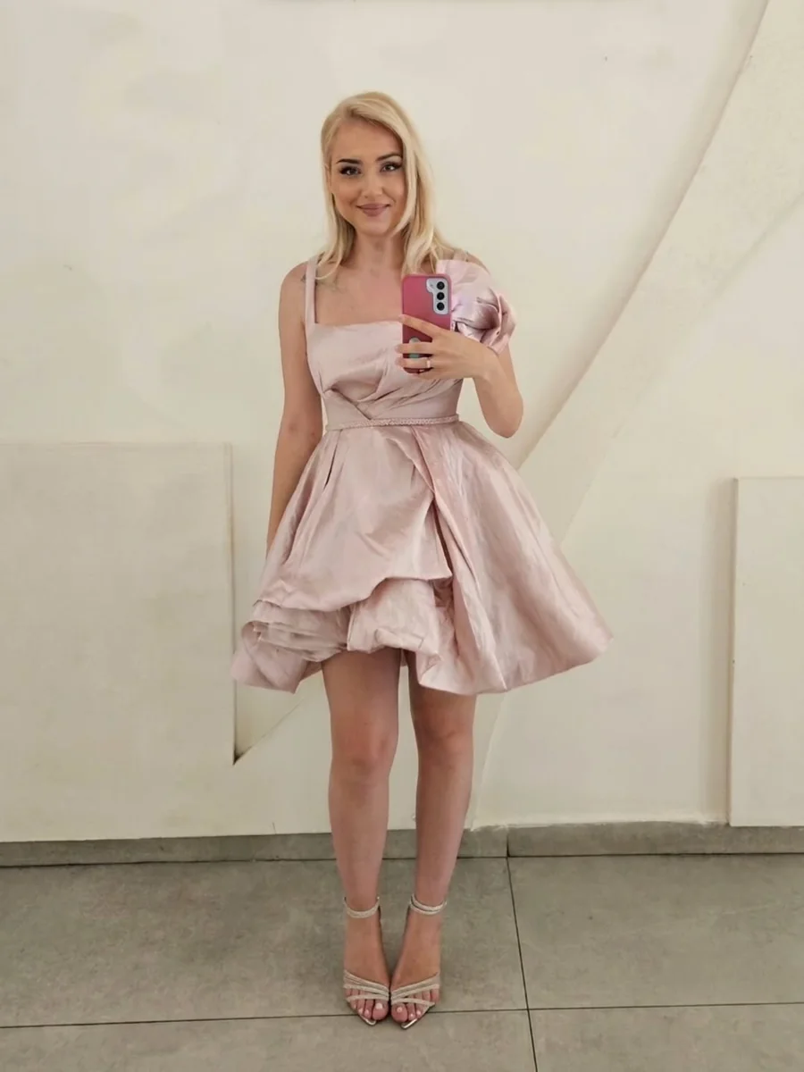 A Satin Mini Where One Bow Does All the Talking on a petite woman