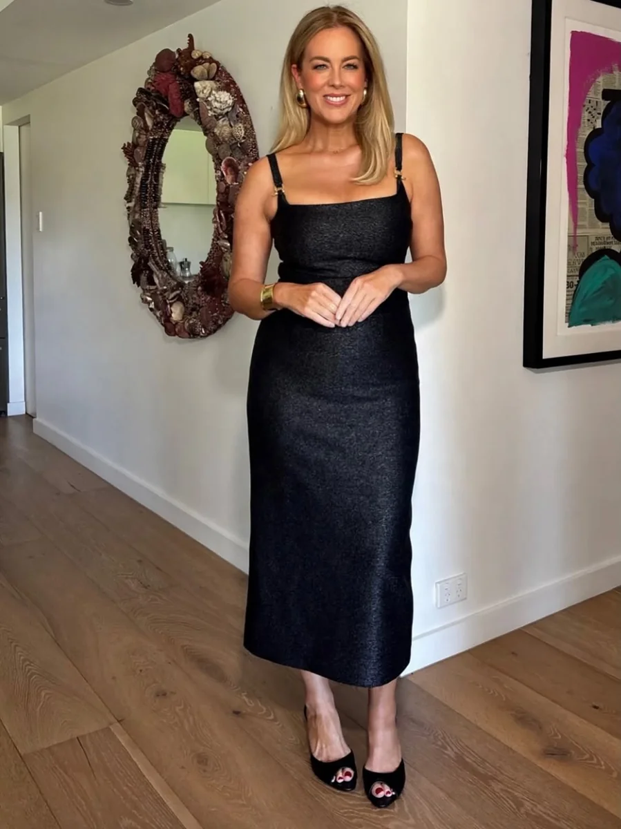 The One-Color Column in Black on a petite woman