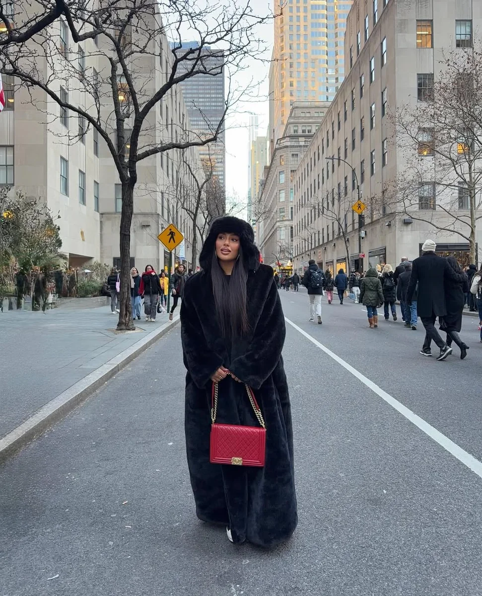 Let One Red Bag Do the Talking on a petite woman