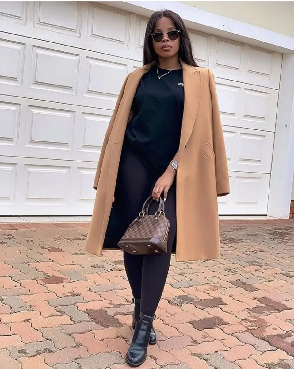 The Belted Camel Wrap That Gives You a Waist on a petite woman