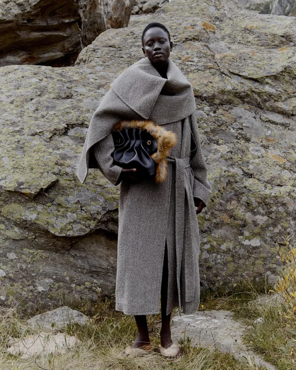The Gray Blanket Wrap That Reads Luxe, Not Swampy on a petite woman
