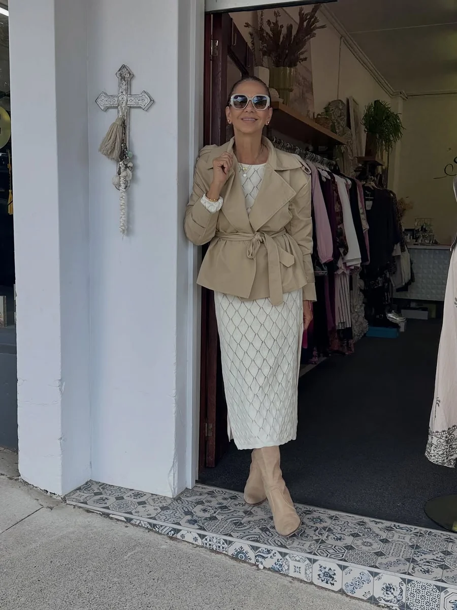 The Cropped Trench That Shows Off Your Legs on a petite woman