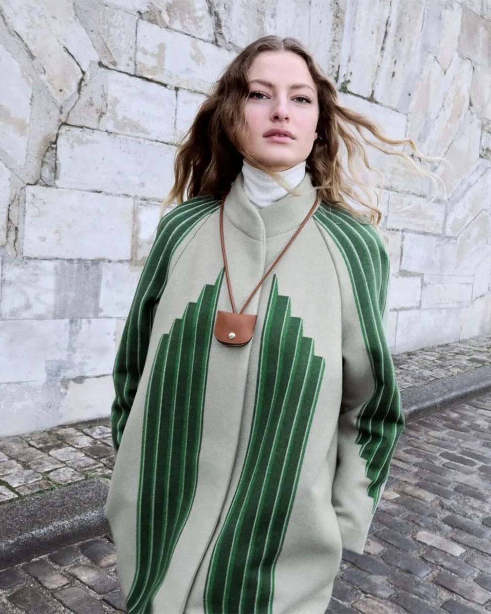 A Striped Knit Poncho for Milder Winter Days on a petite woman
