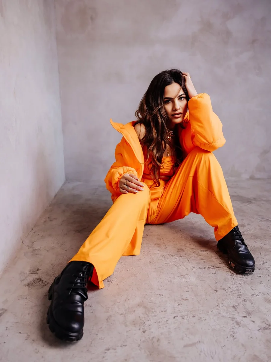 Monochrome Orange, Puffer Included on a petite woman