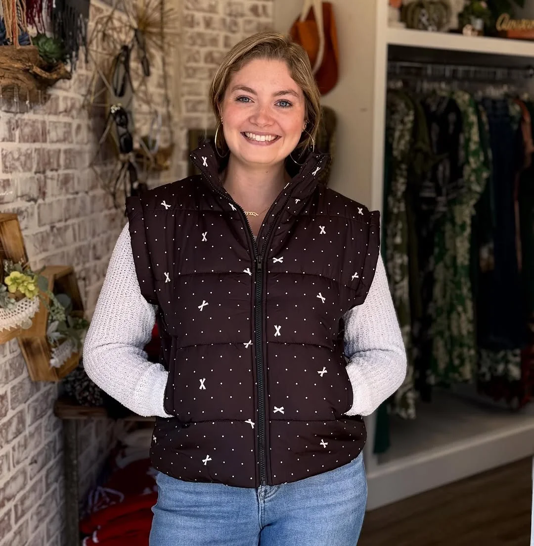 A Printed Vest That Does the Talking on a petite woman