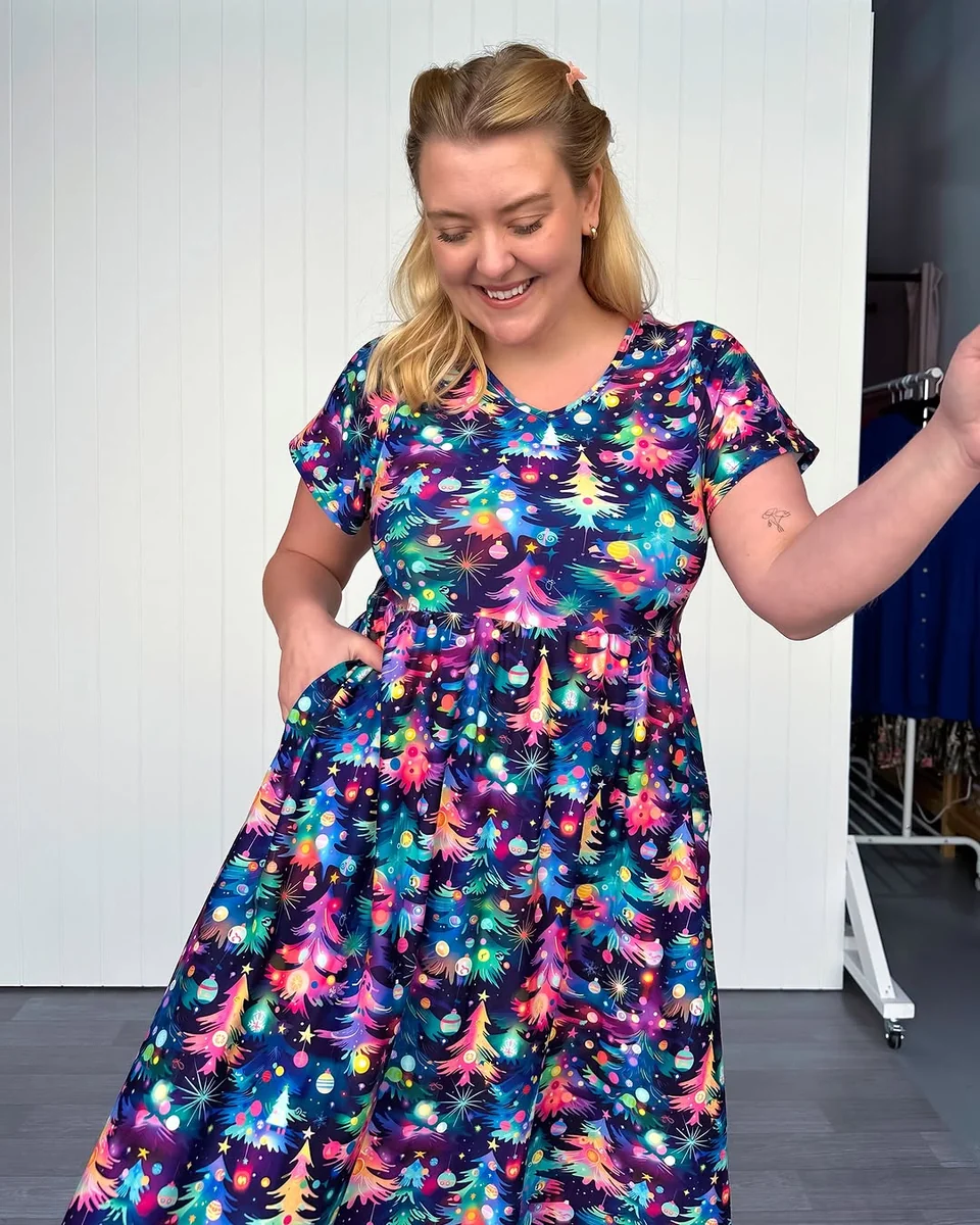 The Fit and Flare Print That Smiles Back on a petite woman