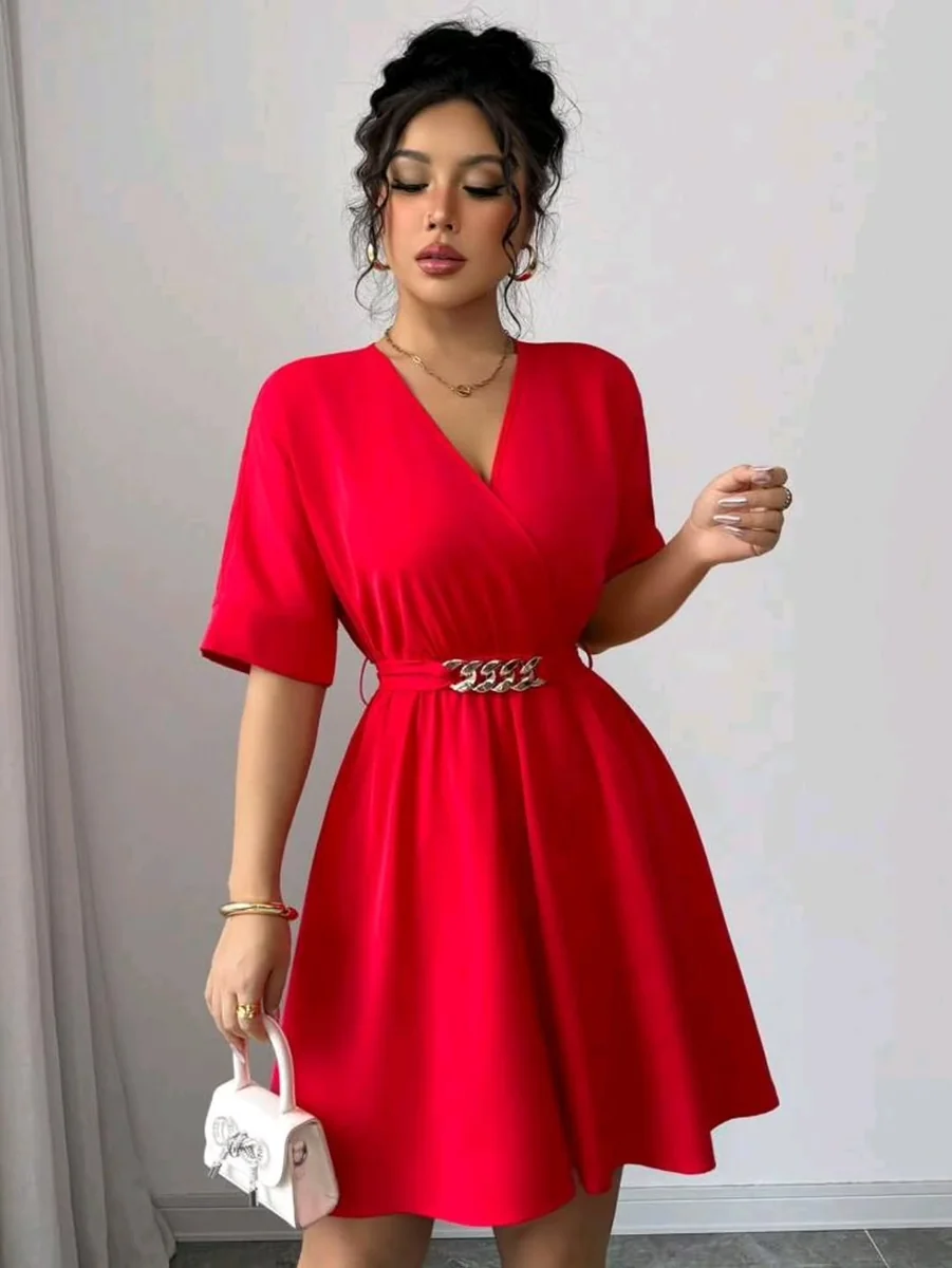 The Chain Belt Trick on a Red Skater Dress on a petite woman
