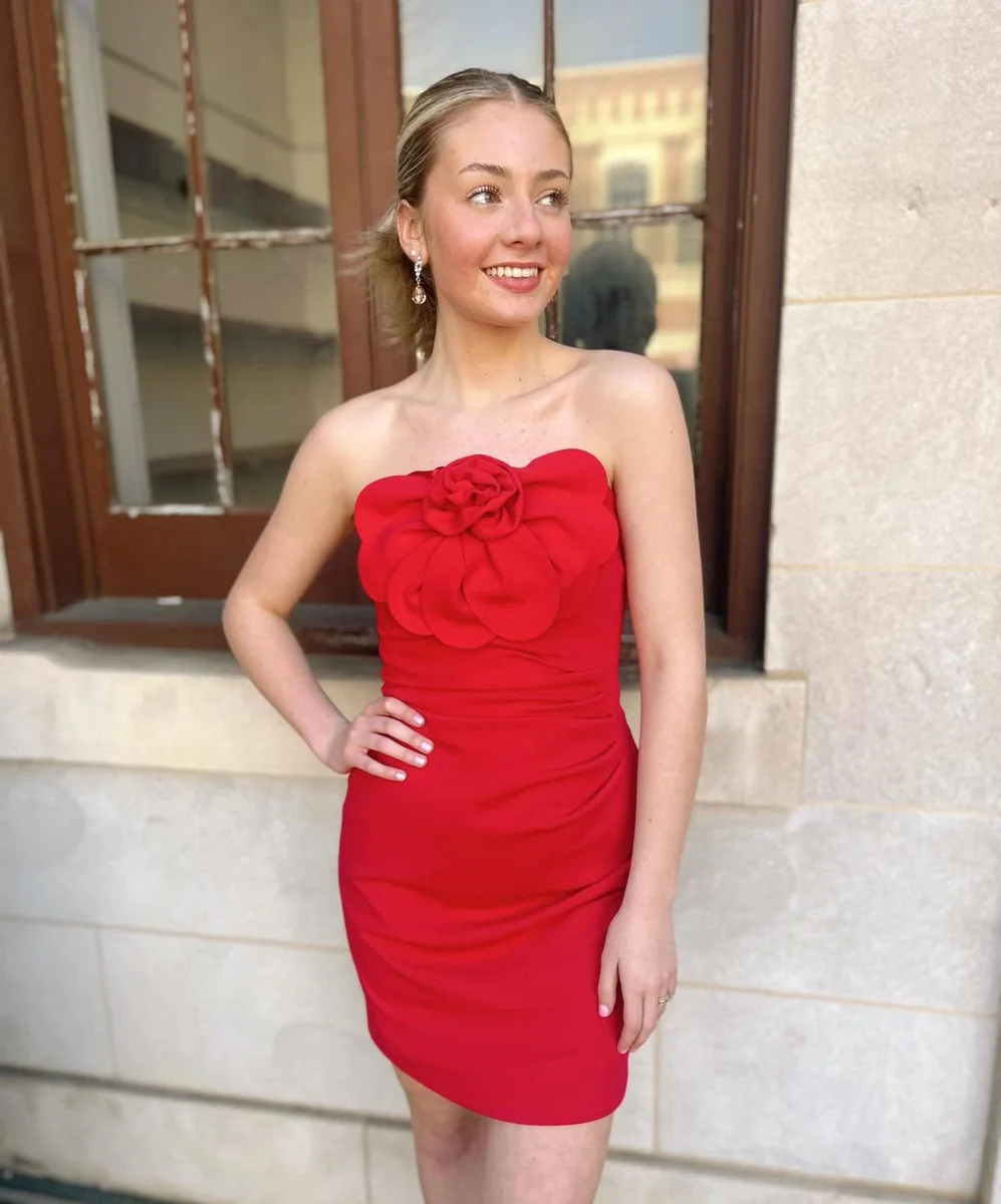 A Red Rosette Dress Owns the Room on a petite woman