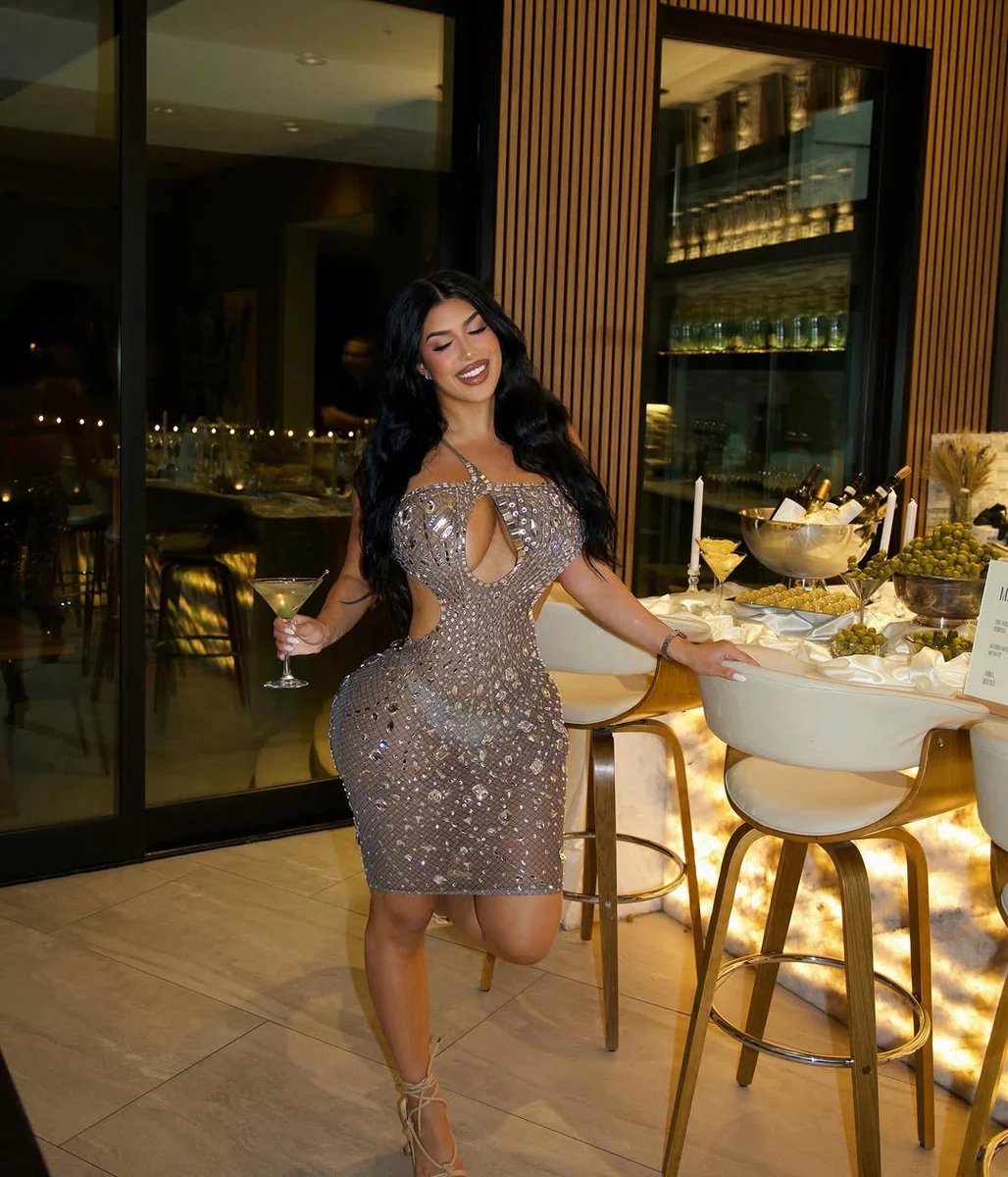 Silver Sequin Cutout Mini on a petite woman