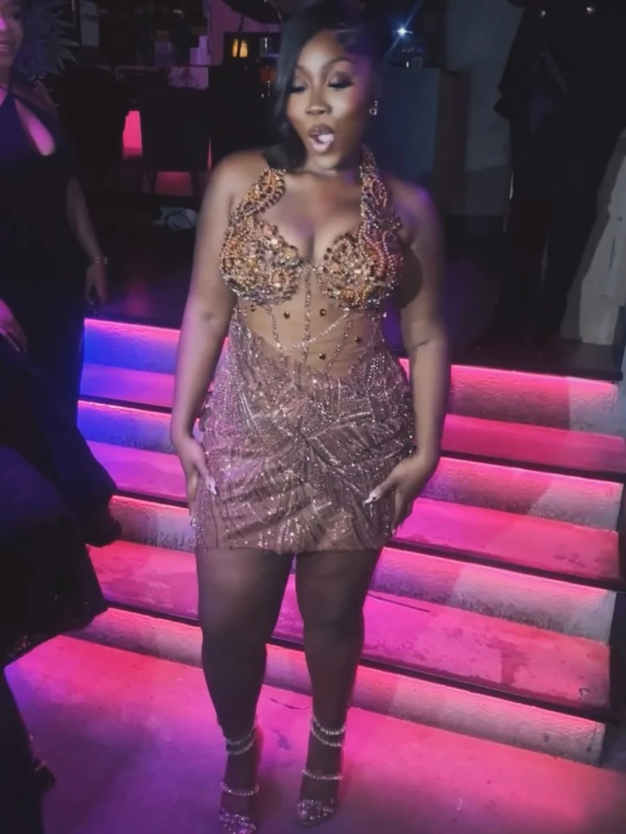Bronze Beading on the Stairs on a petite woman
