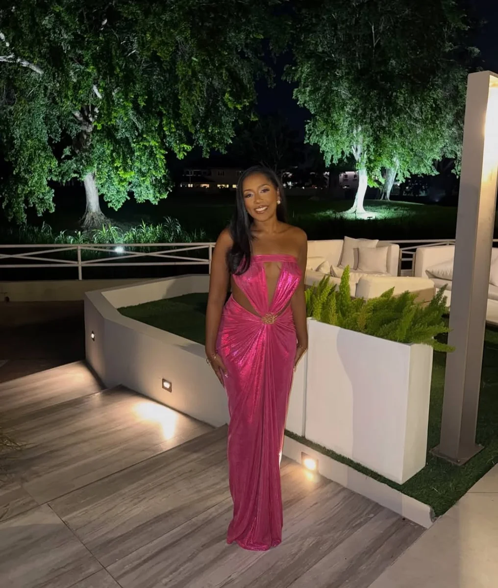 Hot Pink Gown With a Waist Cutout on a petite woman