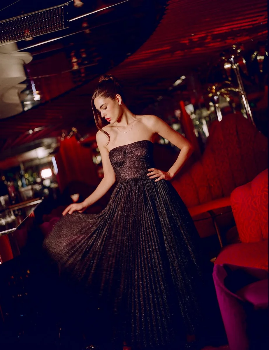 Bronze Pleated Ball Gown on a petite woman